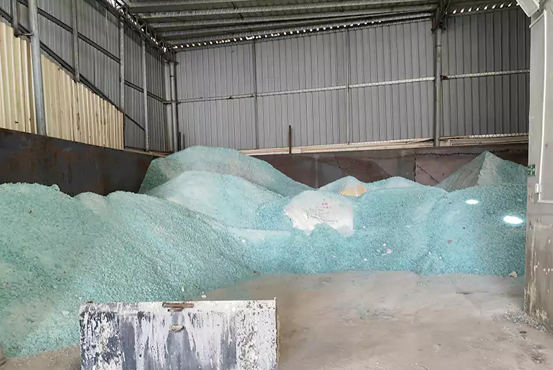Bulk solid sodium silicate stored in bags at the Sanlee Chemicals raw material warehouse.