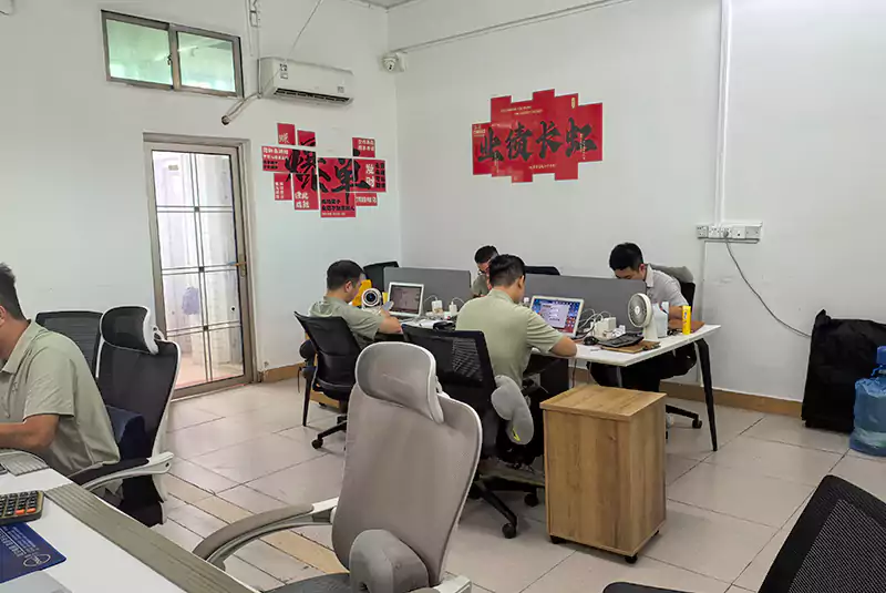 The busy sales and customer service team at work in the Sanlee Chemicals office.