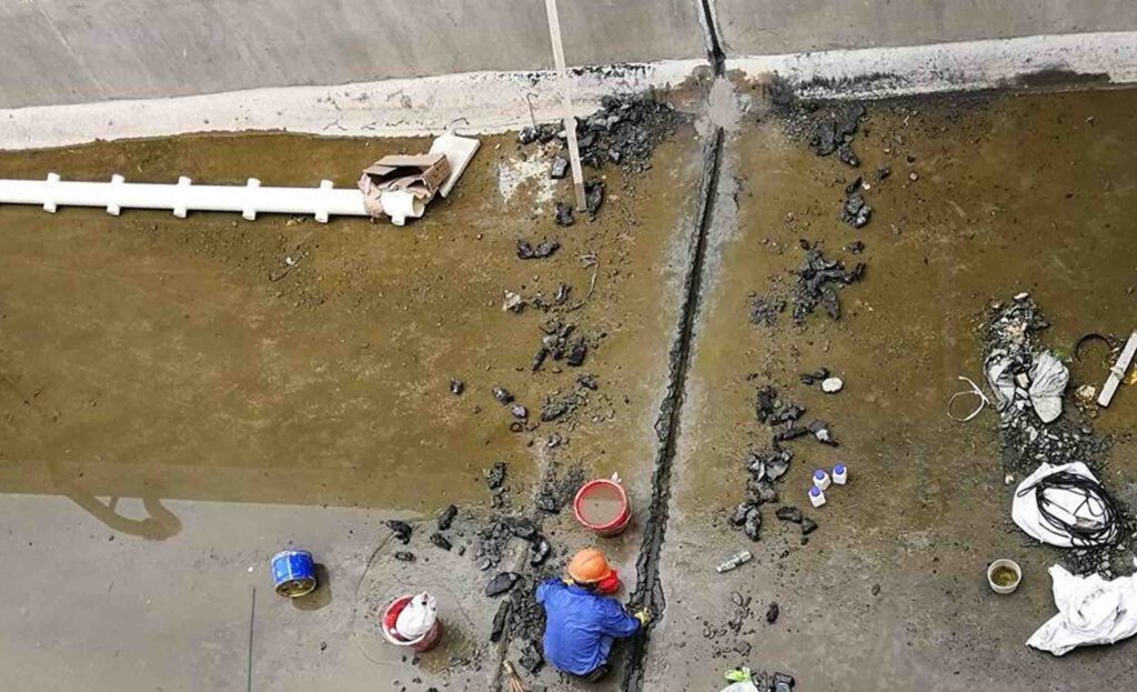 Seepage control treatment of dams and embankments using sodium silicate chemical grouting forming impervious barrier in foundation