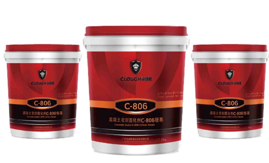 Worker applying liquid concrete densifier to warehouse floor using roller what is a concrete densifier explained on site