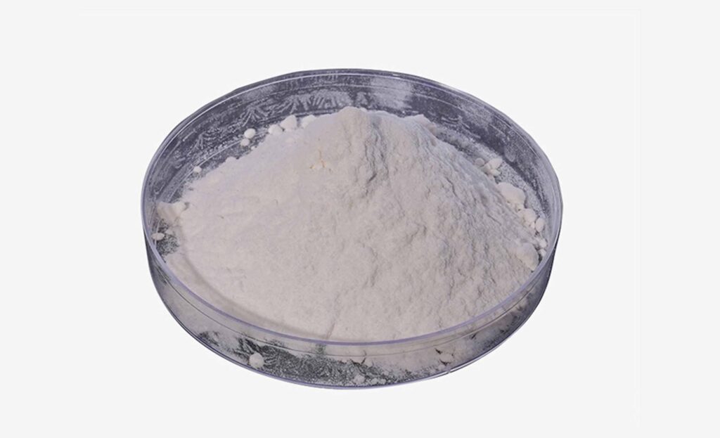 Sodium silicate powder fine white uniform powder in pile showing free-flowing texture for industrial applications