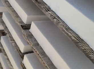 Sodium silicate refractory castable vacuum impregnation showing densified microstructure and alkali-resistant glassy layer