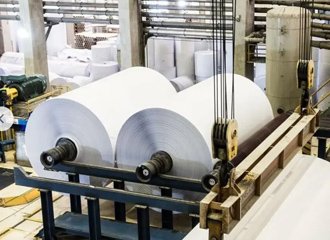 Sodium silicate paper coating binder applied to paper surface for improved strength grease resistance and adhesive protection