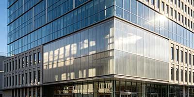 Potassium silicate fire-resistant glass in commercial building facade with curtain wall windows and interior partitions
